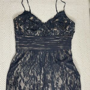 Little Black Laced Dress with golden lining.